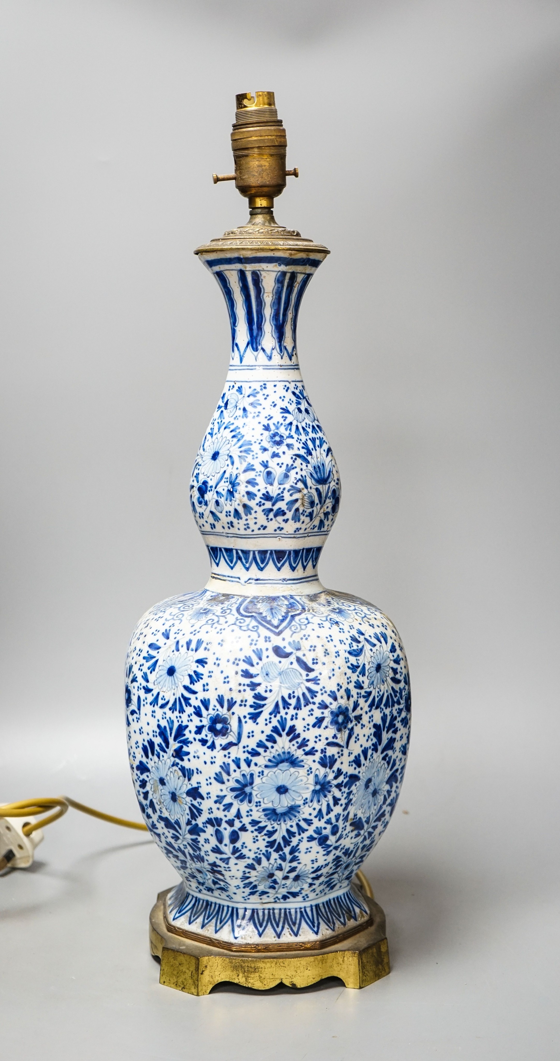 An 18th/19th century Delft blue and white octagonal double gourd vase, mounted as a lamp 50 cm